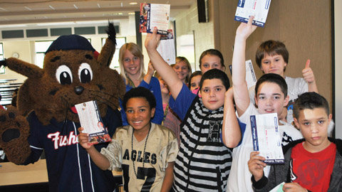 Students at Henry McLaughlin Middle School join Slider for the Fisher Cats Reading Challenge presented by CCSNH. 