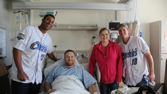 Matt Fields and Buddy Baumann visiting the VA Hospital during the 2014 season was one of the many highlights from a record-setting season for the Storm Chasers in terms of community involvement.